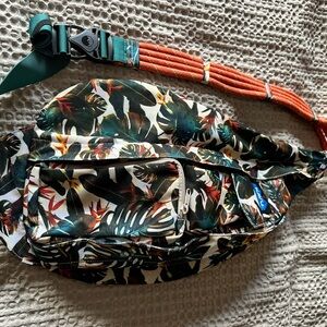 Kavu Tropical Leaf Print backpack with Orange Accents